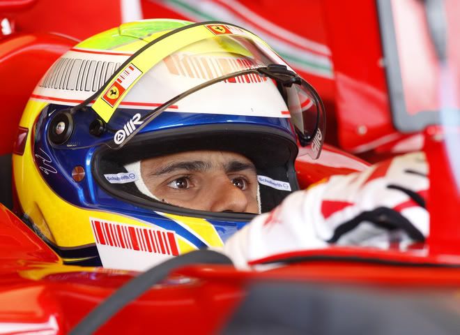 Felipe Massa sits in his car in the pits of the Silverstone racetrack, 06 July 2007